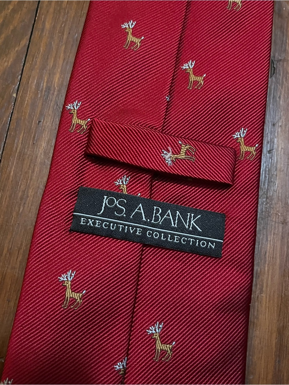 Jos. A. Bank Executive Red Christmas Silk Tie with Gold & White Reindeer Motif